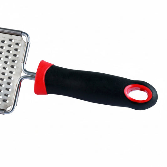 Grater with black handle and red accents on a white background