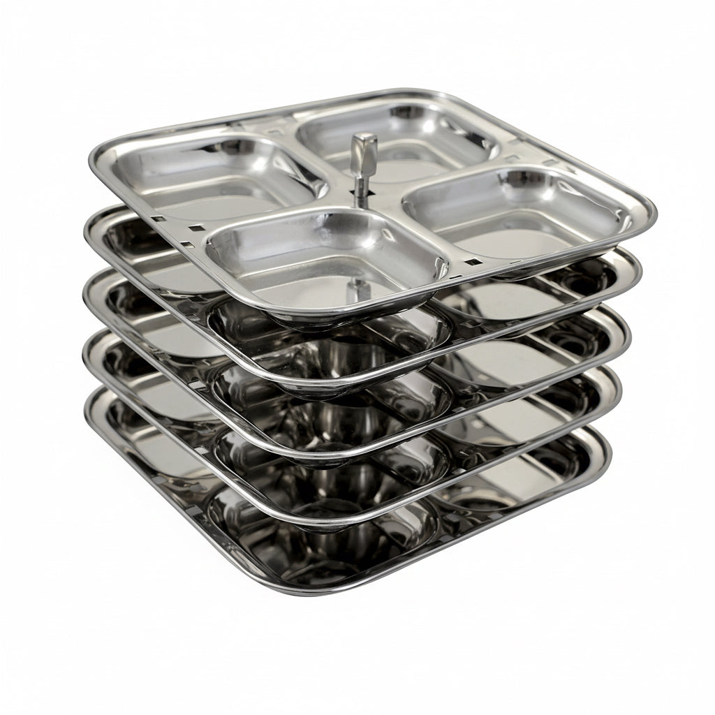 Stack of stainless steel trays on a white background